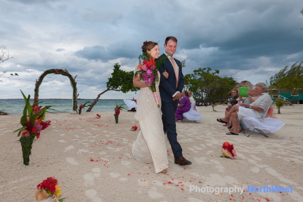 Walking down the aisle of your private island beach wedding