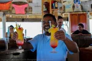 Our bartender serving two Belize All Inclusive Tropical Drinks