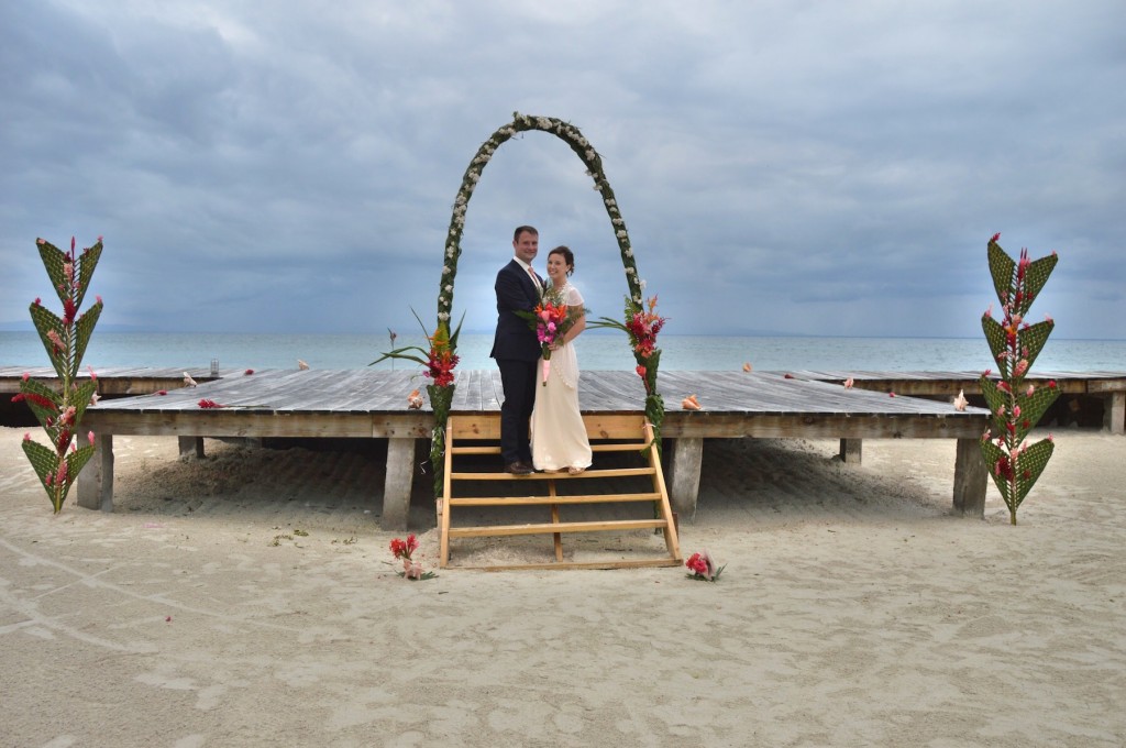 The bride and groom on their wedding day at an all inclusive private island