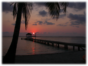 Sunrise over the dock of Coco Plum Island Resort