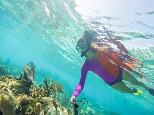 Snorkel atop the coral reef of Belize! 