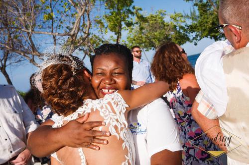 Coco Plum Island Wedding - Staff hugs