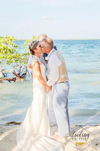 David kissing his bride