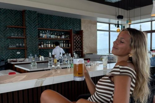 Guest enjoying a beer at the bar.
